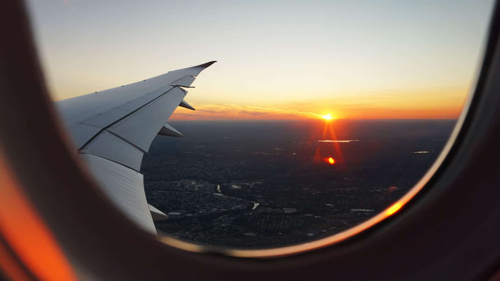 Sunset from a plane window on a flight